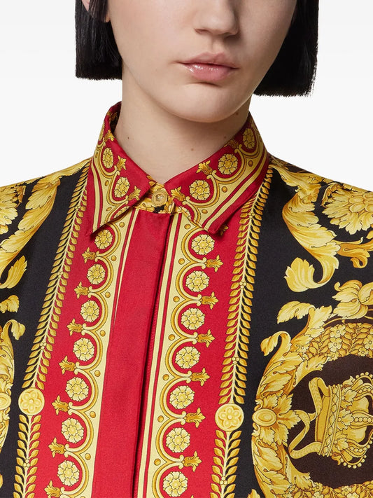 Female model wearing a Versace black, gold and red '92 barocco silk blouse.