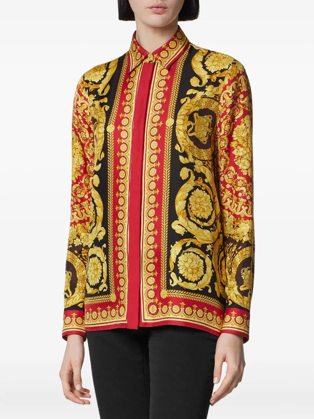 Female model wearing a Versace black, gold and red '92 barocco silk blouse.
