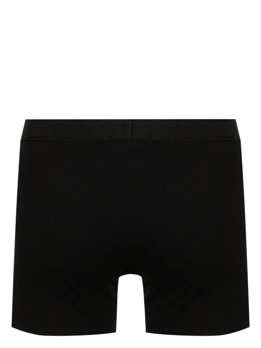 Black boxer briefs on a white background.