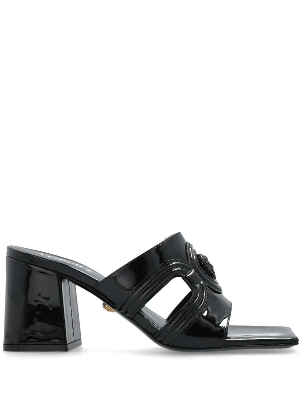 Black patent mule heel with a Medusa '95 design on a white background.