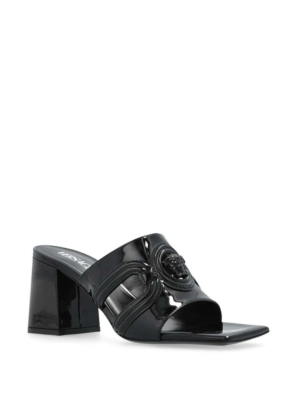 Black patent mule sandal with a VERSACE Medusa '95 design on a white background.