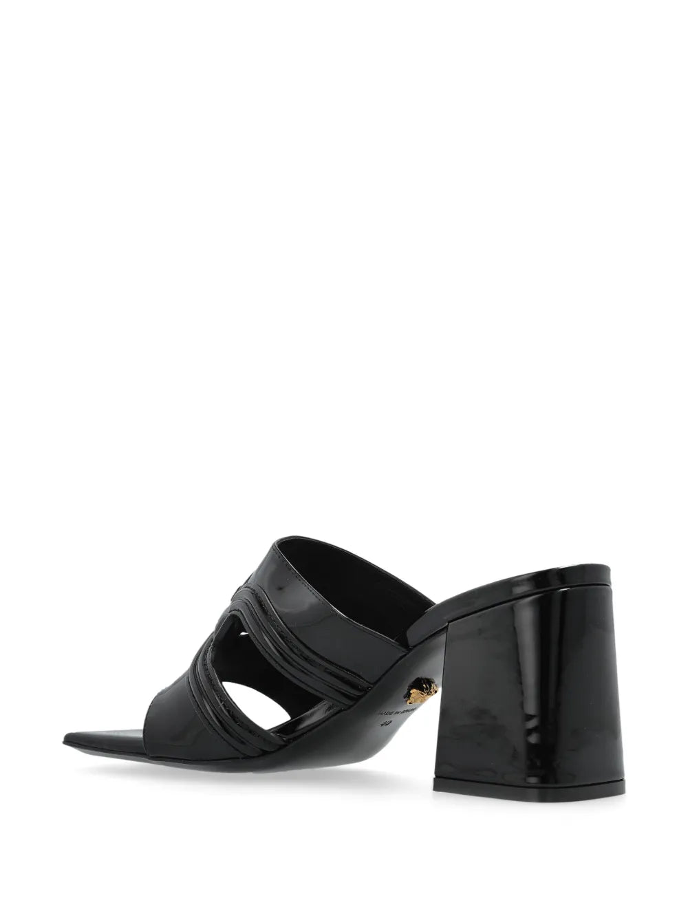 Black patent mule sandal with a Medusa '95 design on a white background.