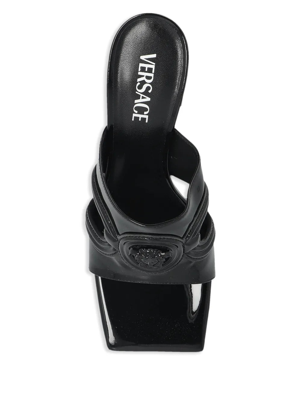 Black patent mule sandal with a VERSACE Medusa '95 design on a white background.