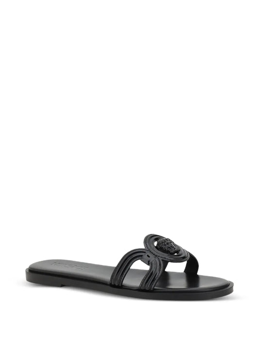 Black Medusa '95 sandal with a logo on a white background