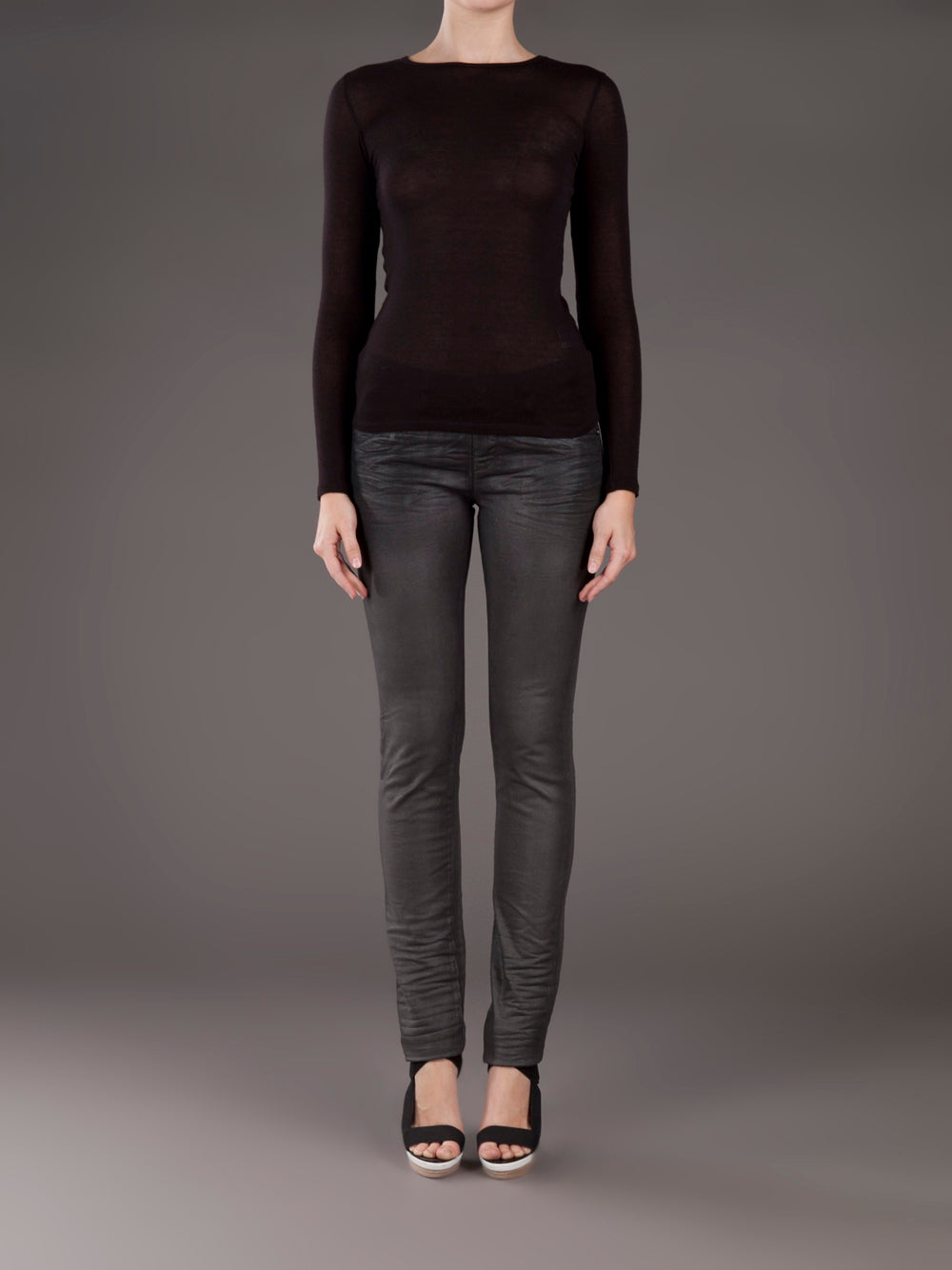 Black slim cut Diesel jeans.