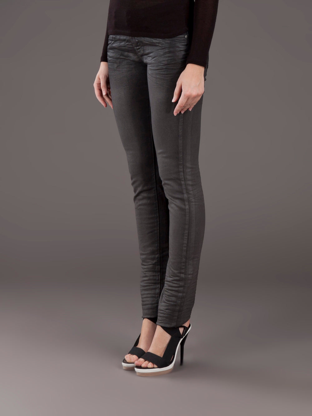 Black slim cut Diesel jeans.