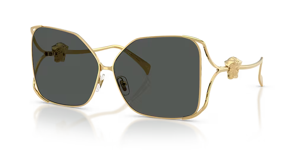 Gold-framed Versace sunglasses with Medusa on the temples.