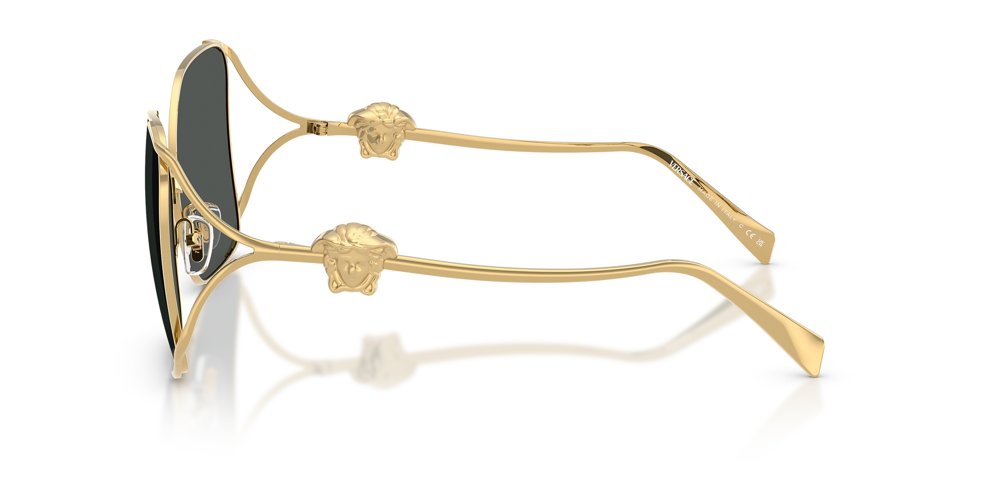 Gold-framed Versace sunglasses with Medusa on the temples.