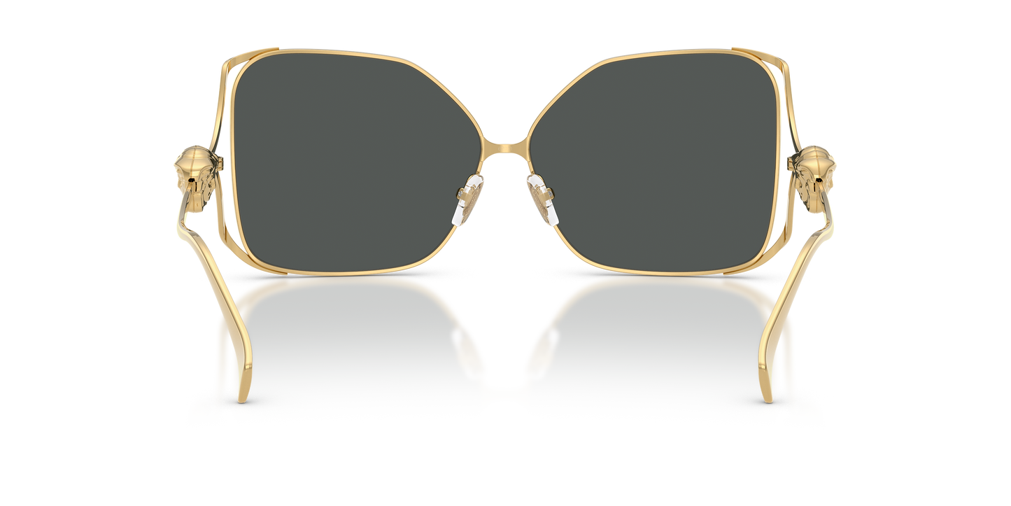 Gold-framed Versace sunglasses with Medusa on the temples.