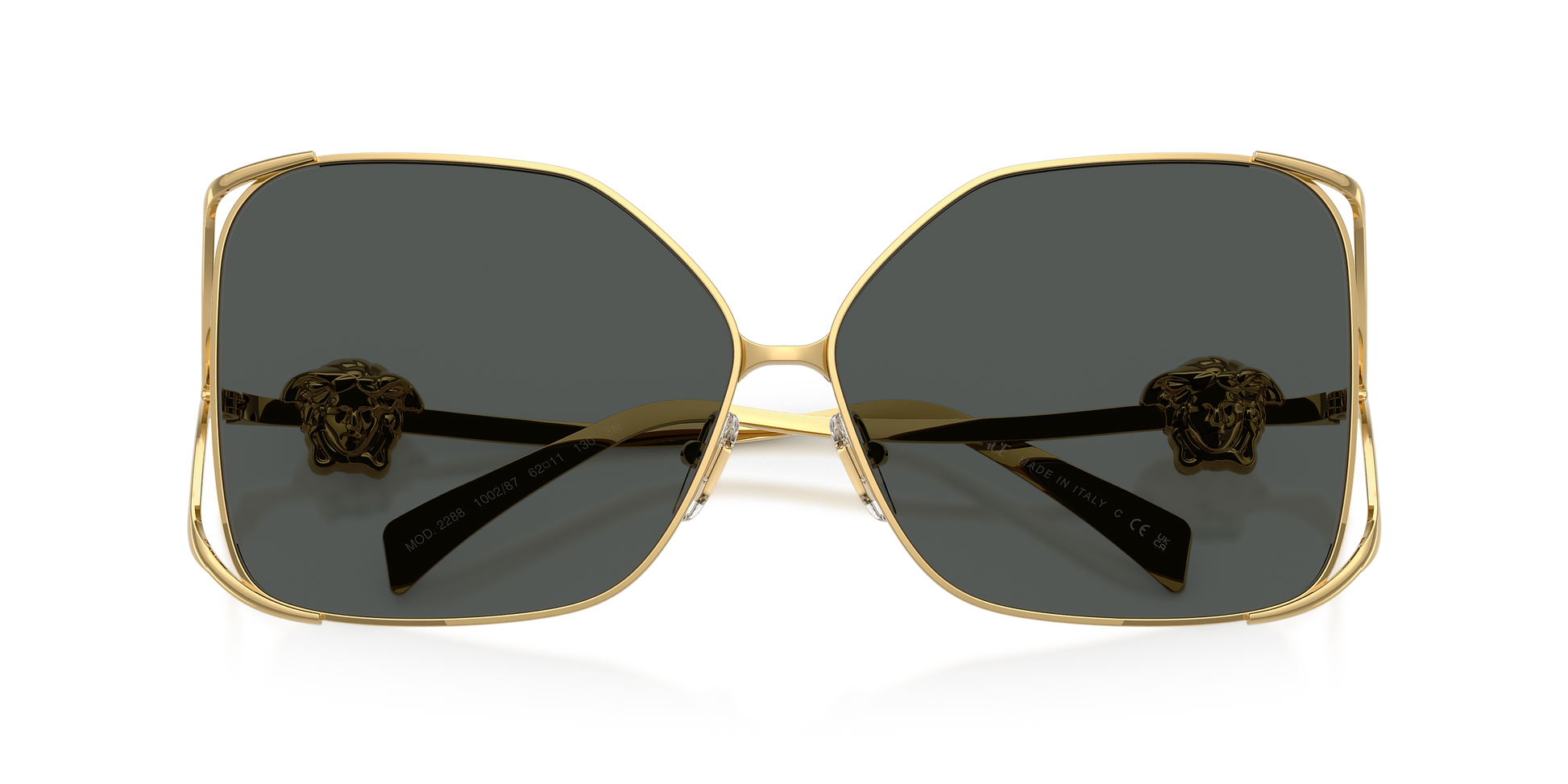 Gold-framed Versace sunglasses with Medusa on the temples.