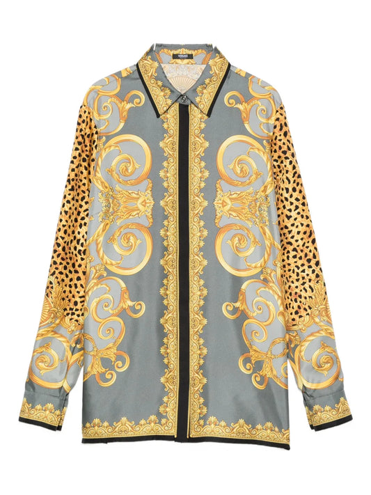 Silk shirt with gold and leopard print patterns on a grey background
