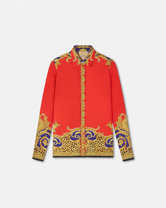 Red silk shirt with gold and purple baroque print on a white background.