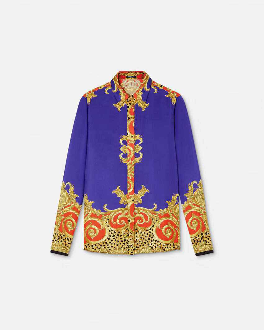 Purple shirt with gold and red baroque-style patterns on a white background.