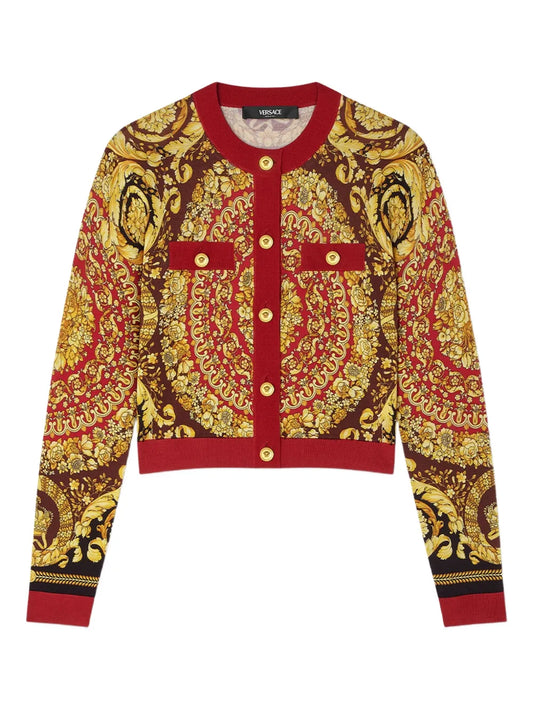VERSACE barocco sweater with red and gold design on a white background.