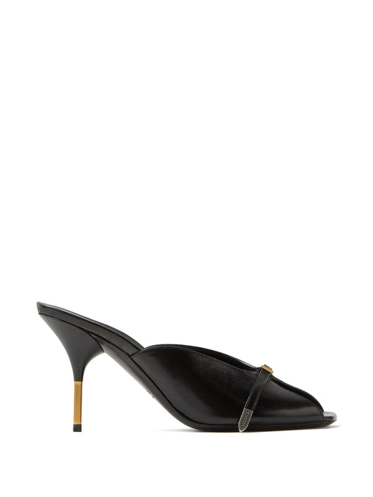 Black high-heeled Versace mule with a strap on a white background