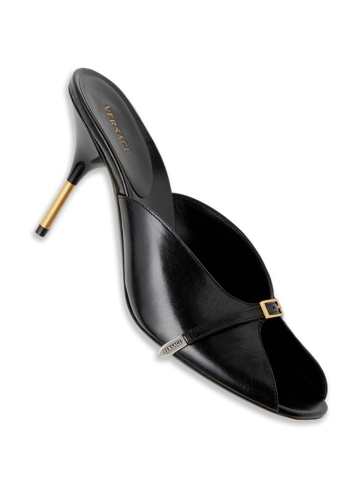 Black high-heeled Versace shoe with gold accents on a white background