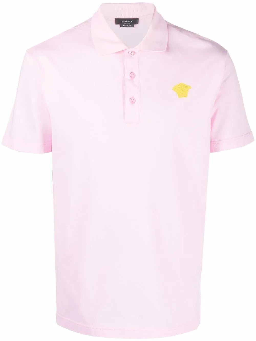 Pink polo shirt with a gold medusa logo.