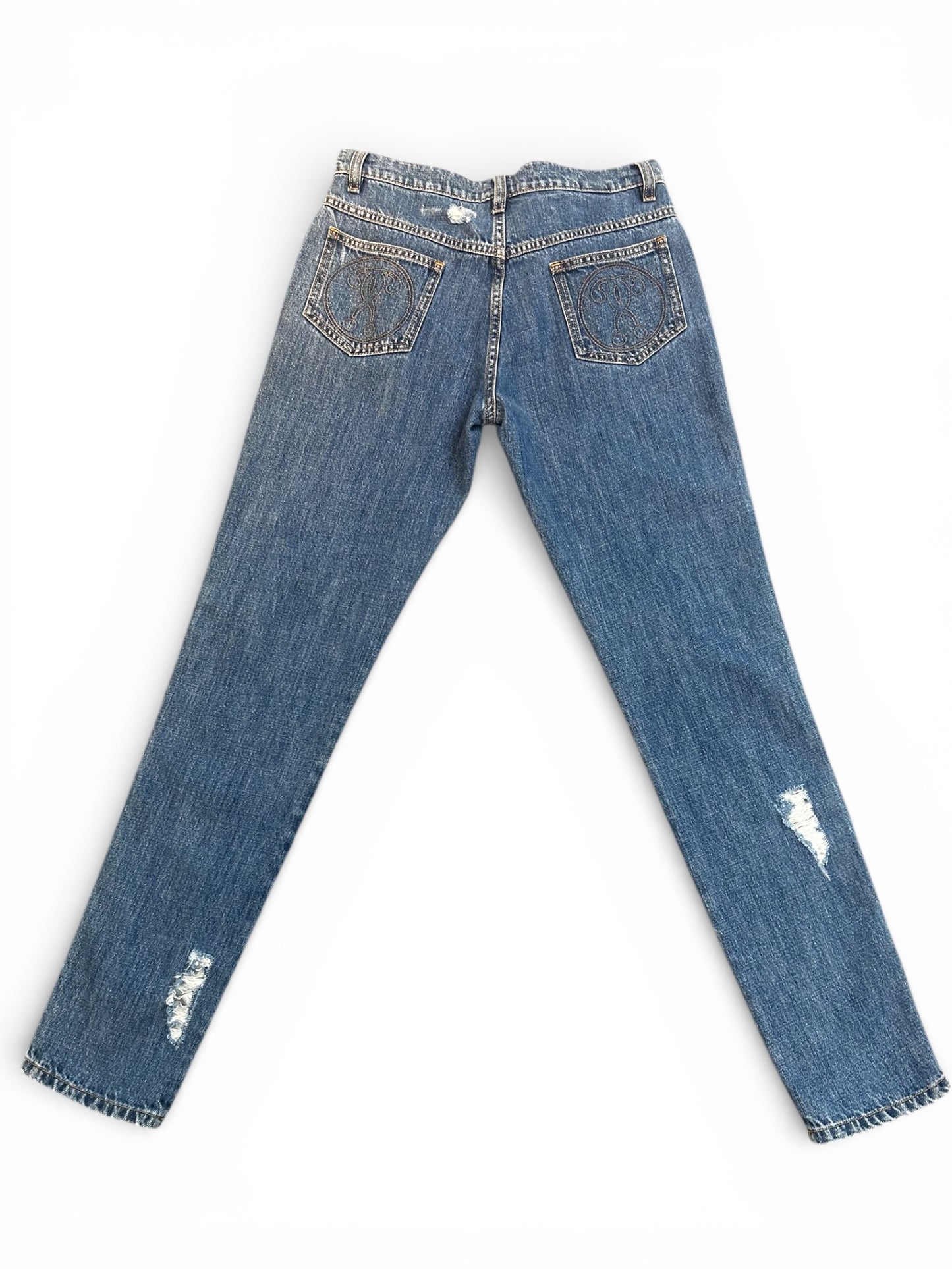 Back of distressed blue jeans.